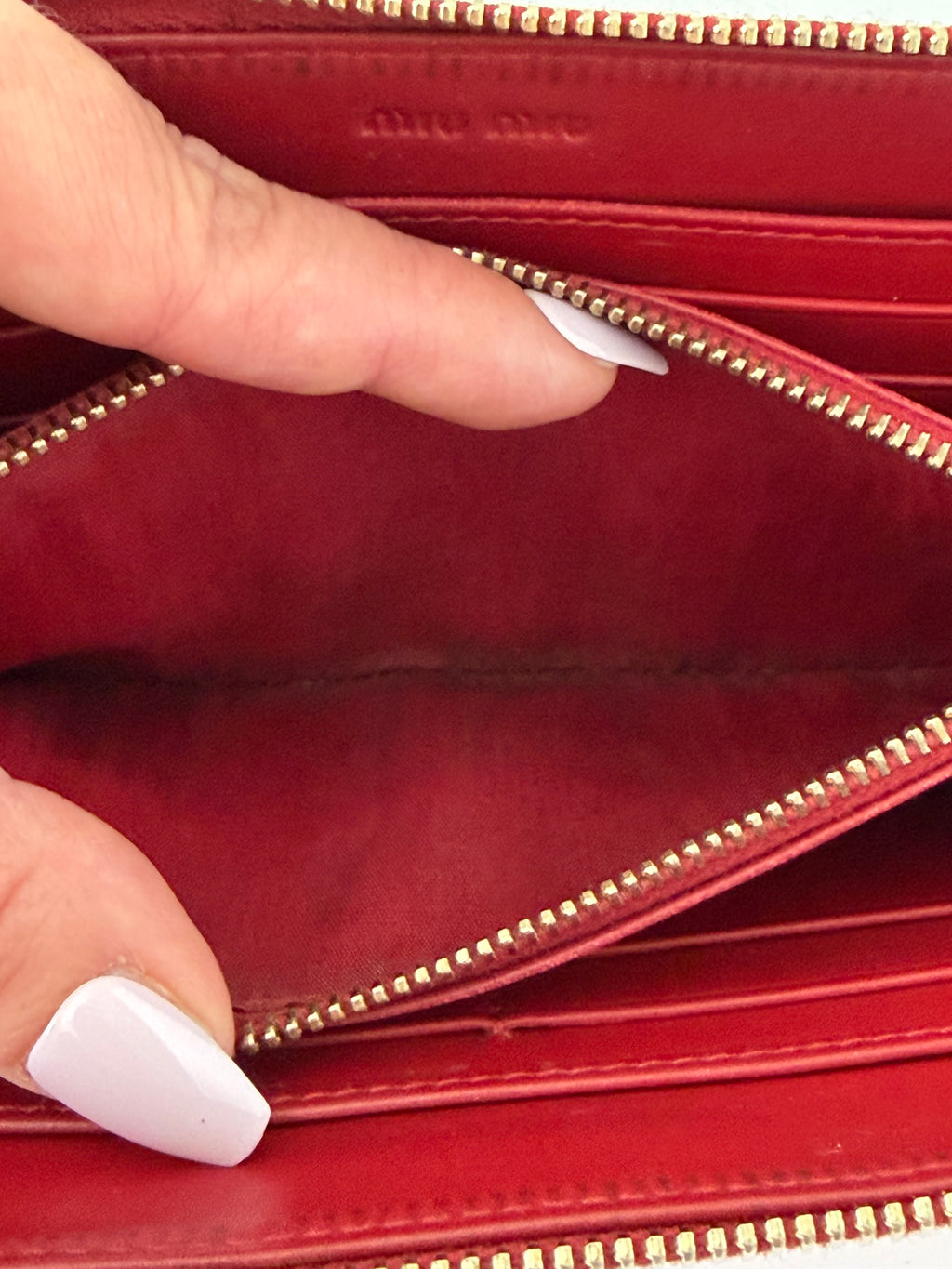 Mui Mui Ostrich Embossed Zip Around Wallet